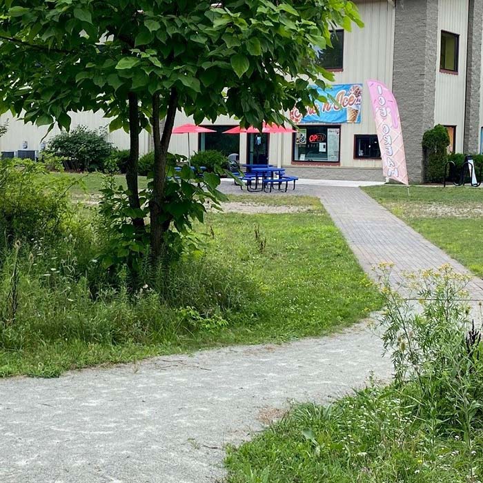 Path from the WHT trail leading to Fire n Ice ice cream and snack shop in Central Murrysville, Pennsylvania.